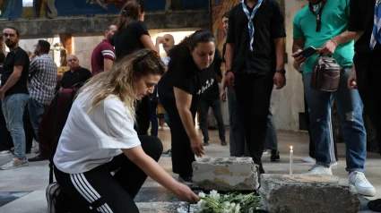 Cristianos sirios rezan durante la vigilia por las víctimas del atentado a la Iglesia de Damasco