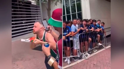 Un aficionado brasileño comete un sacrilegio con la pizza ante la mirada de aficionados del Inter de Milan
