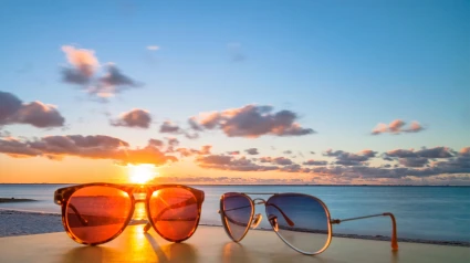 EJWCAR sunglasses at sunset on famous tropical Playa del Norte beach in Isla Mujeres, Mexico