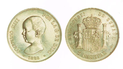 MONEDA CON EL ROSTRO DE ALFONSO XIII DE NIÑO