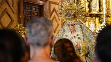 Imágenes de la veneración de Nuestra Señora de la Esperanza Macarena tras la controvertida actuación de mantenimiento y conservación.