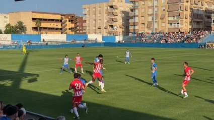Momento del partido entre el Águilas FC y la UD Almería