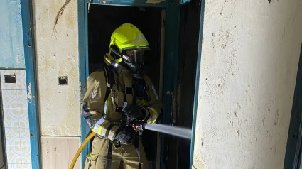 Intervención de un bombero de Narón en el incendio