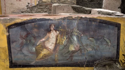 Italy, Pompeii - December 26, 2020.New great discoveries in the Archaeological Park of Pompeii ruins. .Food vendor. Street food restaurant.Archaeologists discover an inlaid floor of polychrome marble, earthenware pots and have even clues about what was on the menu, with one paella-type dish including a mixture of birds, fish and snails