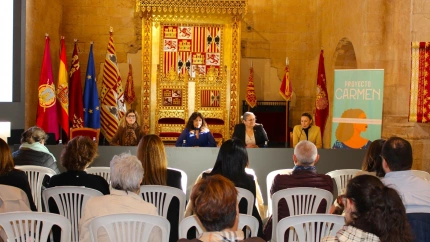 La presidenta de la Federación de Organizaciones  de Mujeres y ponentes en las jornadas sobre posibilidades de empleo para beneficiarias del proyecto Carmen