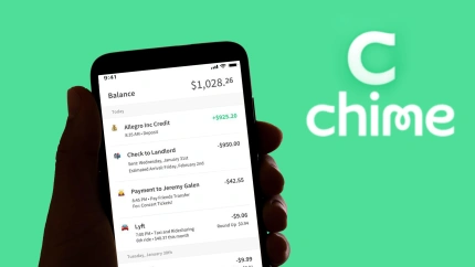 El logotipo de la aplicación de banca y pagos en línea Chime se ve en la pantalla de un teléfono móvil y en el fondo