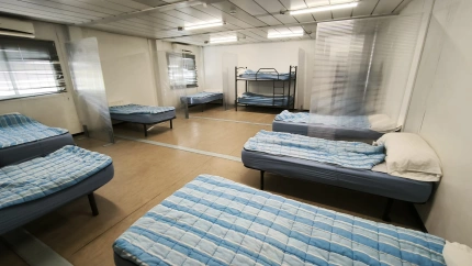 Camas en la casa de acogida Madre del Redentor de Cáritas