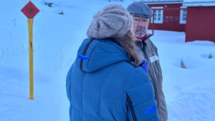 Expósito con una inuit