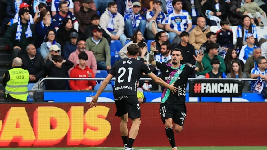 Los jugadores del Málaga celebrando un gol