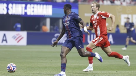 Willian Pacho y Harry Kane, en el PSG - Bayern