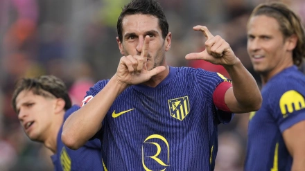 Koke celebra su gol en el Girona-Atlético