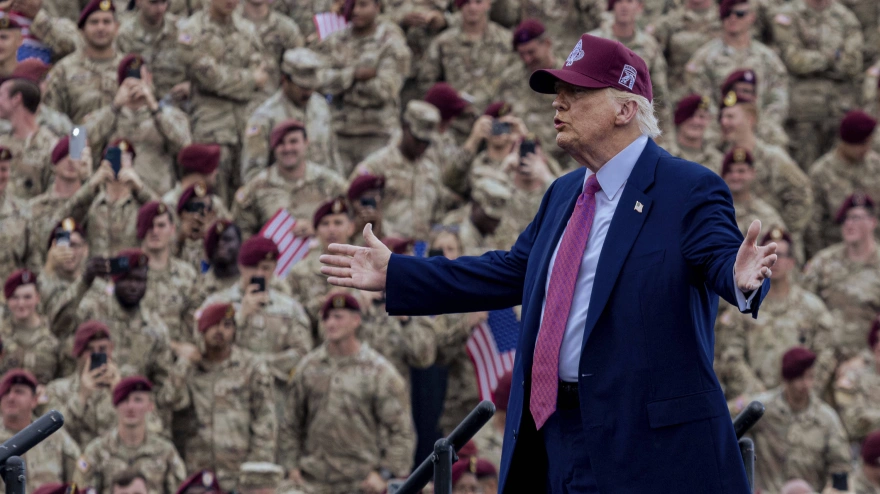 U.S. President Donald Trump gestures to the crowd before delivering remarks celebrating the Army 250 birthday at Fort Bragg Military Base, June 10, 2025 in Fort Bragg, North Carolina.