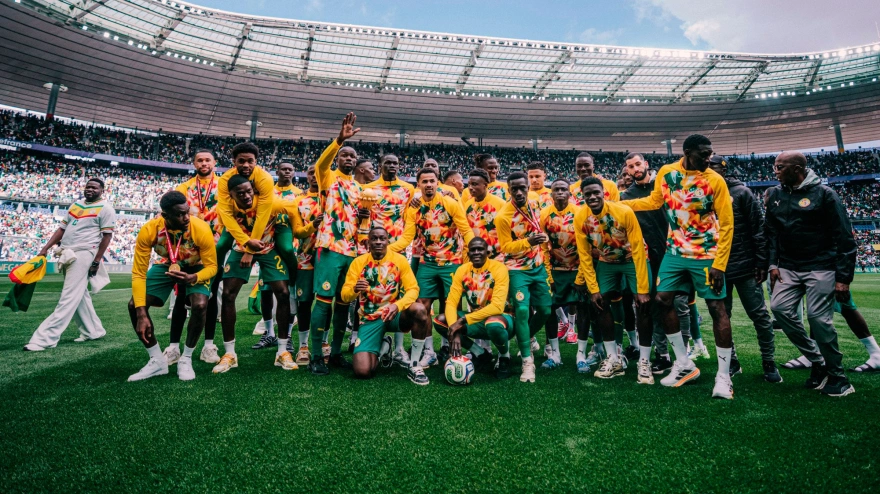 Los jugadores de Senegal celebra la victoria de la Copa de África sobre Saint Denis